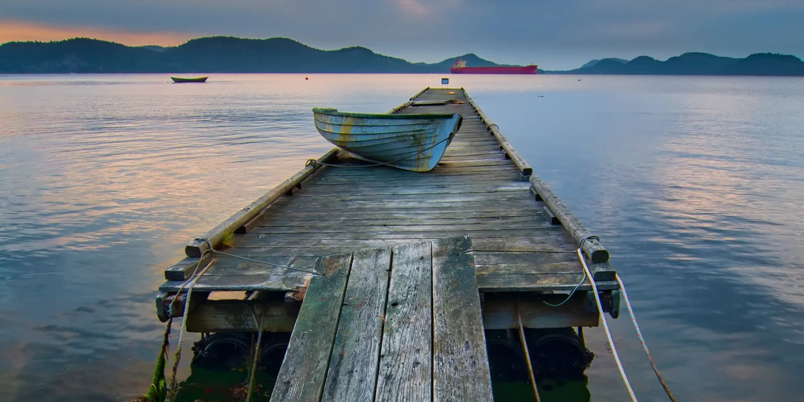 blue-boat-gray-wooden-dock (1)